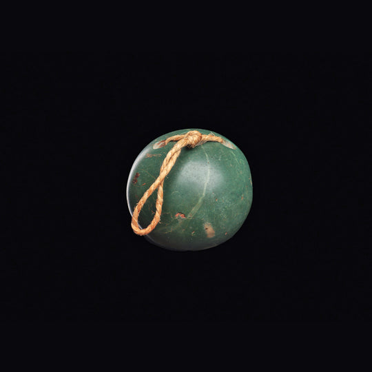 A Costa Rican Green Serpentine Bola Ball, ca. 500 - 1000 CE