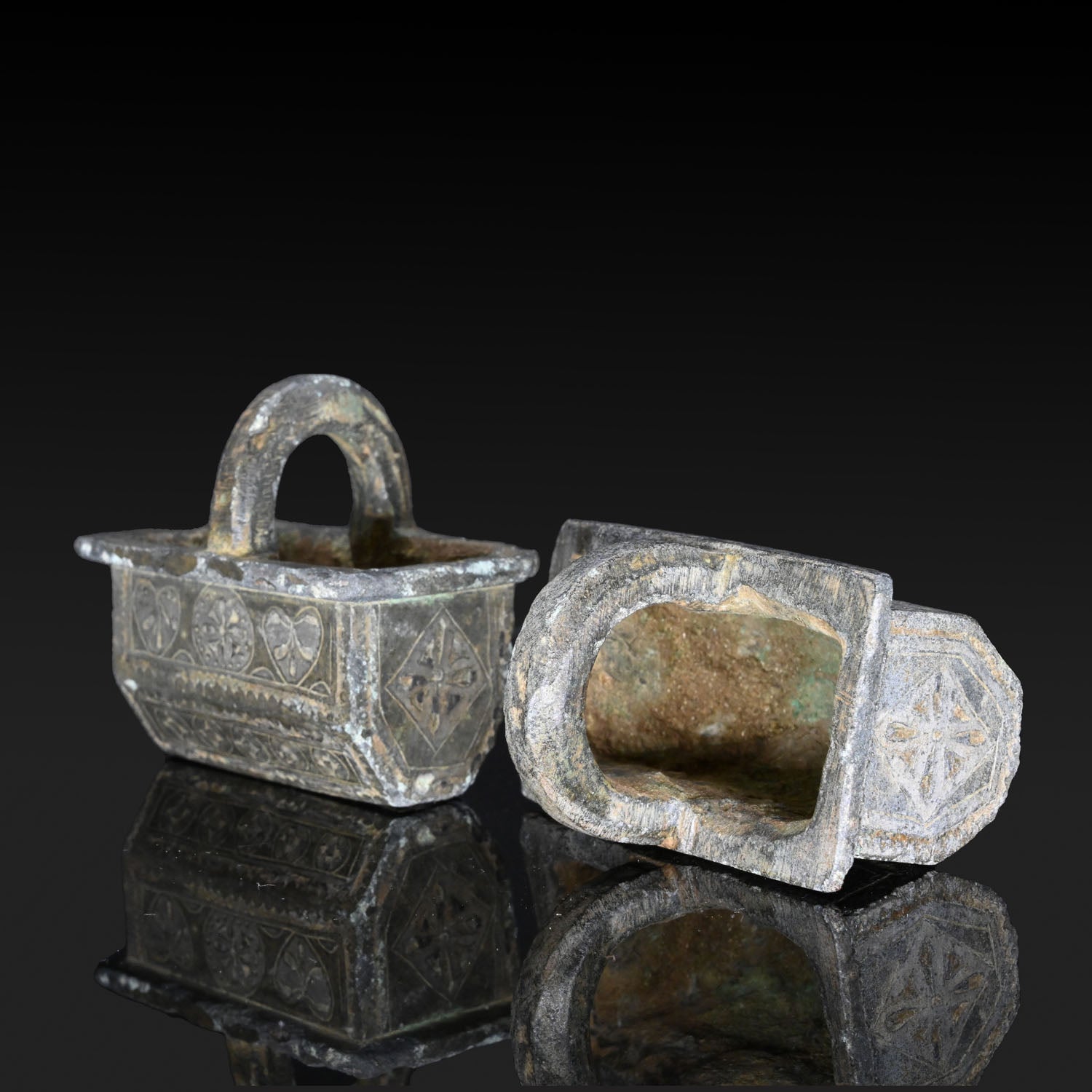 A Pair of Byzantine Copper and Silver Chariot Fittings, Late Roman Imperial Period, ca. 4th century CE