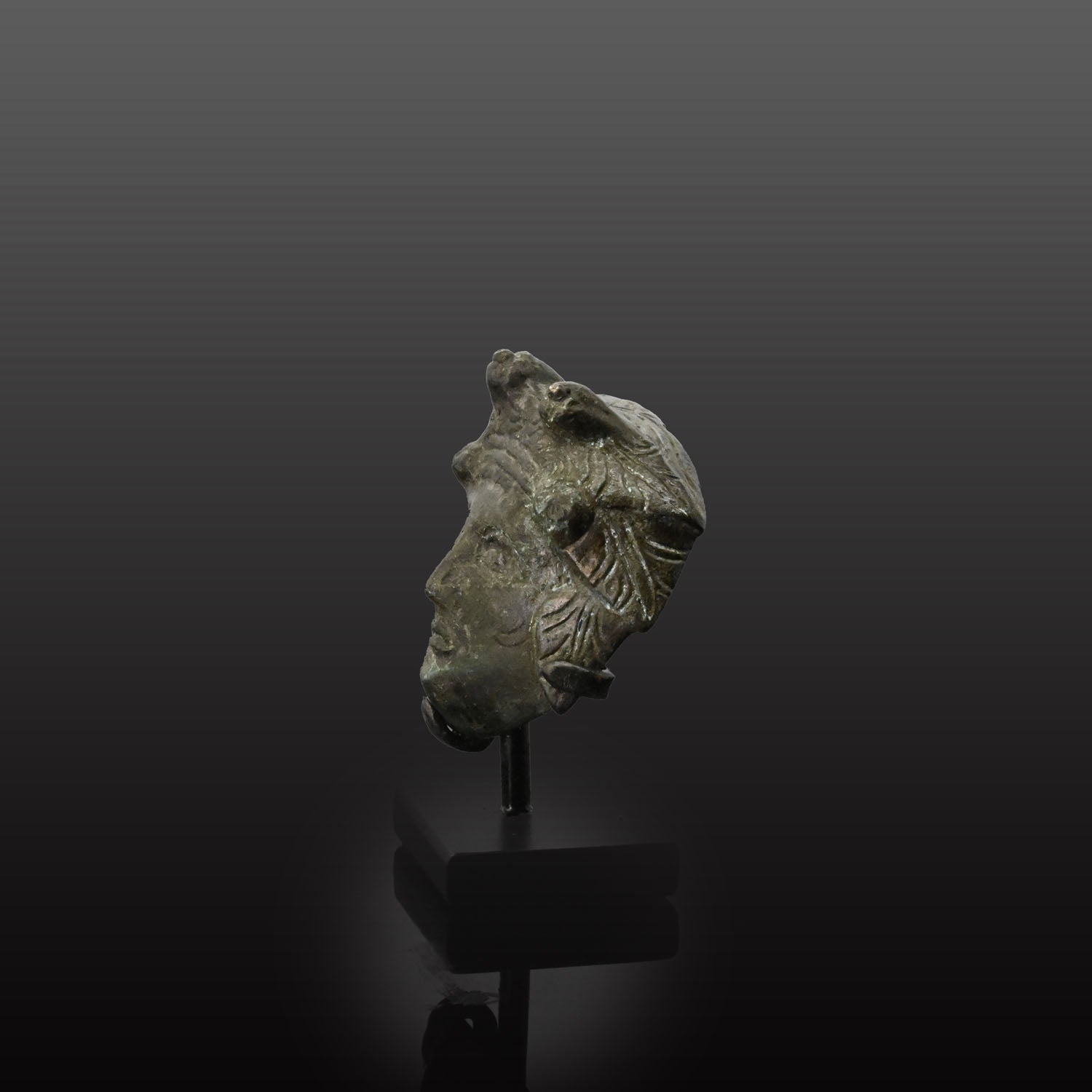 A Roman Bronze Applique of Dionysos, Roman Imperial Period, ca. 2nd century CE