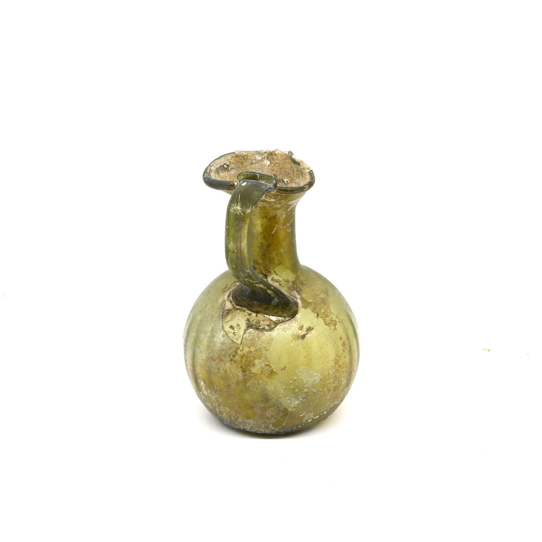 A Roman Glass Ewer, Late Roman Imperial Period, ca. 3rd - 4th century CE