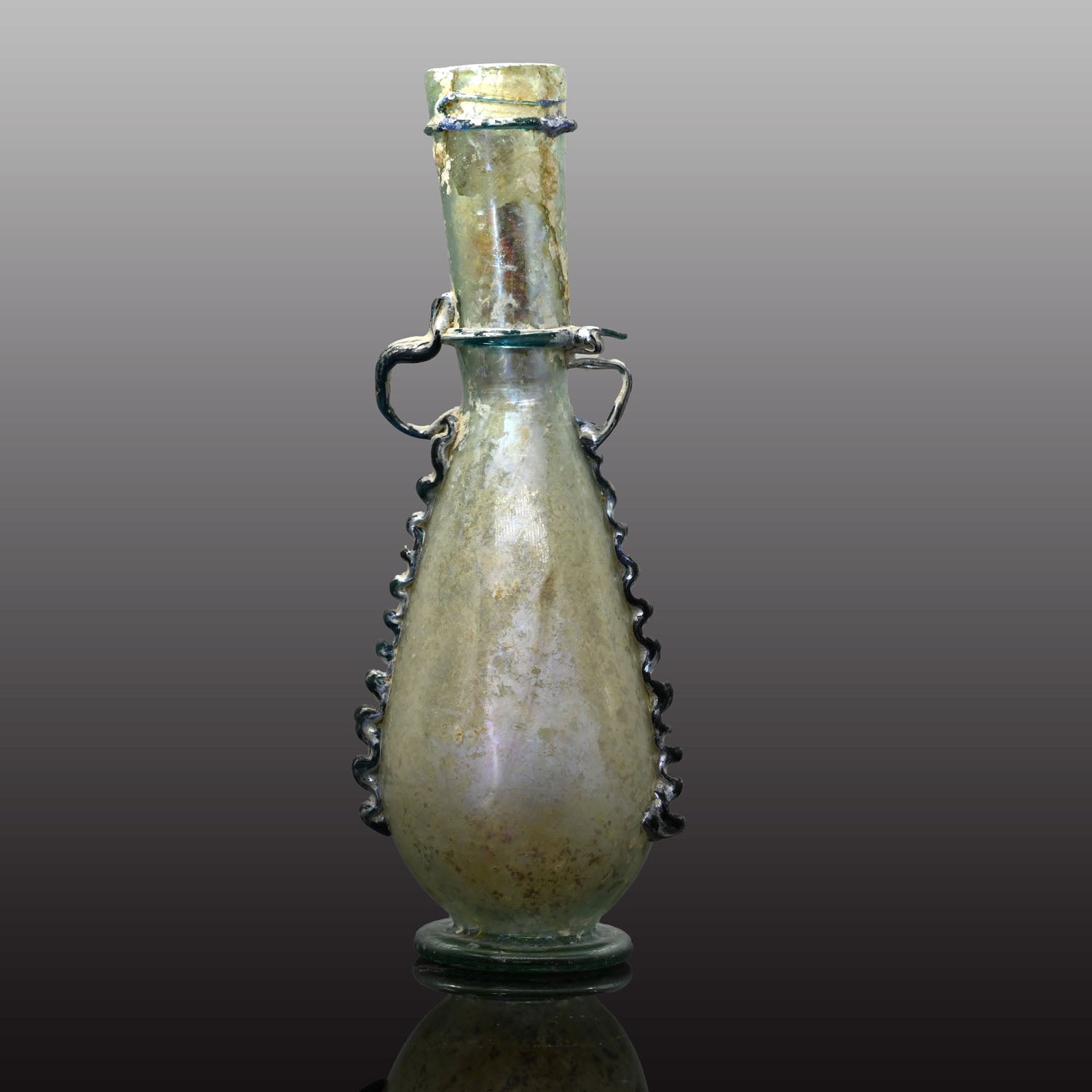A Roman Glass Decorated Bottle, Roman Imperial Period, ca. 1st - 2nd century CE