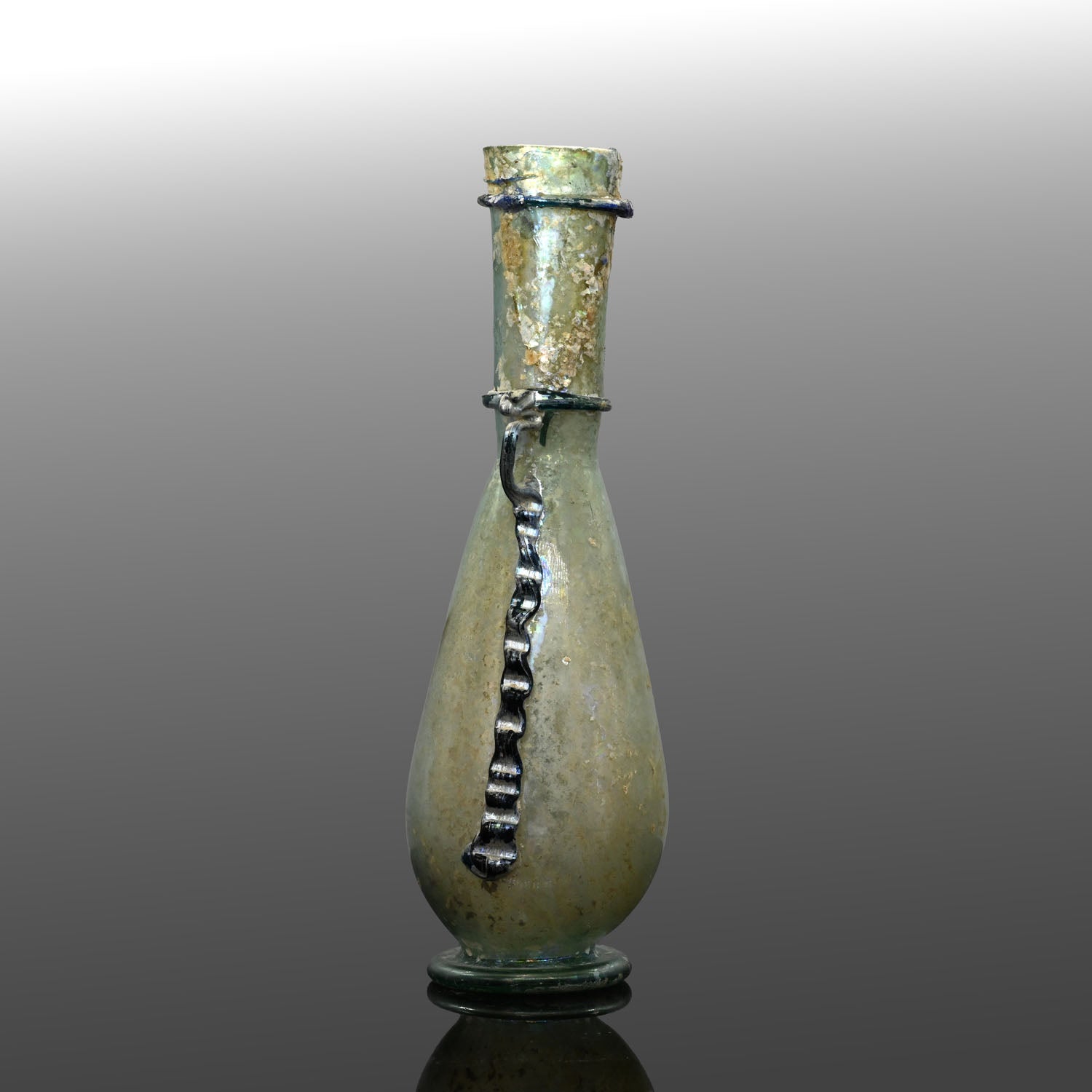 A Roman Glass Decorated Bottle, Roman Imperial Period, ca. 1st - 2nd century CE