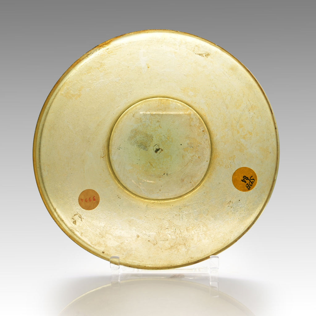 A Roman Yellow Glass Plate, Roman Imperial Period,  ca. 1st century CE