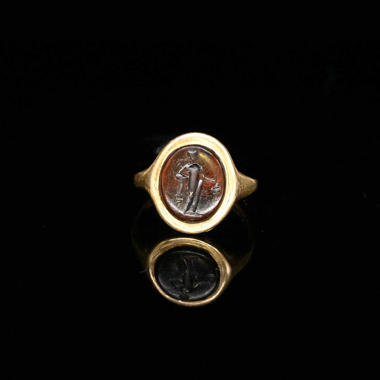A Gold Ring with Roman Garnet Intaglio of Mercury, Flavian Period, ca. 65 - 85 CE