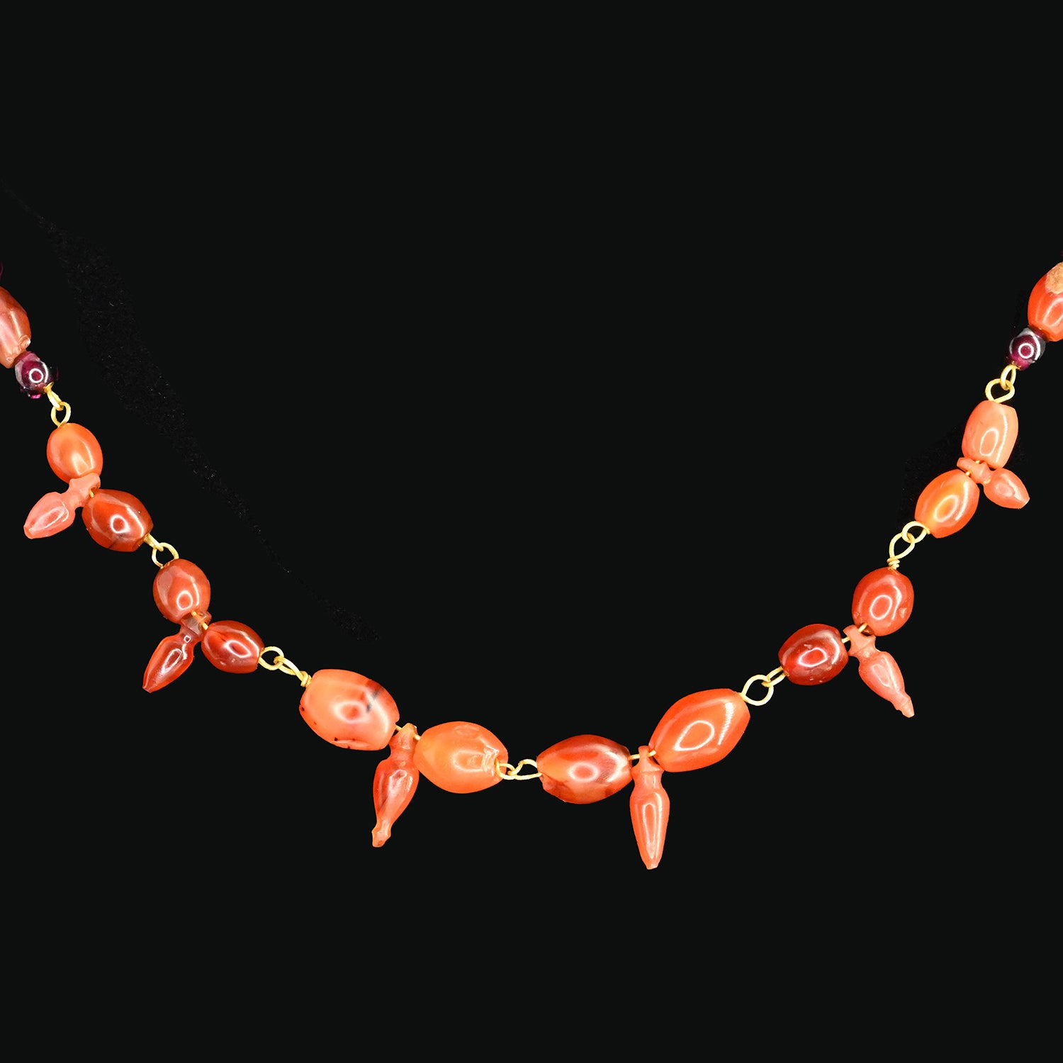 A Roman Carnelian and Garnet Necklace with Amphora Shaped Pendants, Roman Imperial Period, ca. 2nd - 3rd century CE