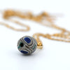 A Roman Glass Eye Bead set as a Pendant, Roman Period, ca. 1st century BCE