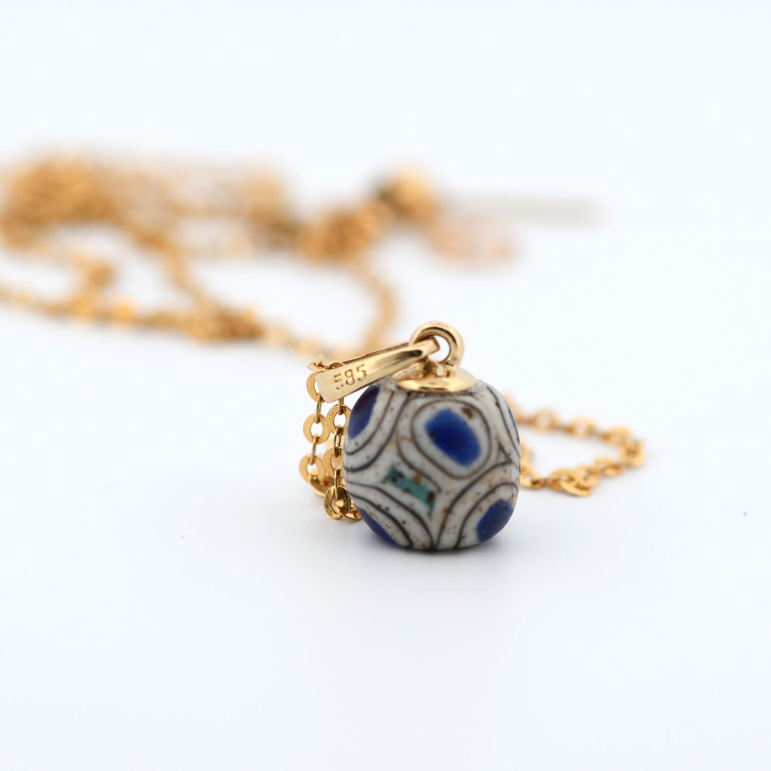 A Roman Glass Eye Bead set as a Pendant, Roman Period, ca. 1st century BCE