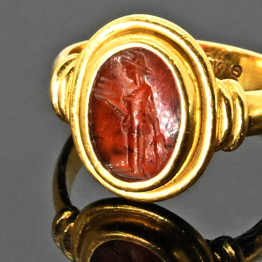 A Roman Carnelian Intaglio Ringstone of Mercury, Roman Imperial Period, ca. 1st - 2nd century CE