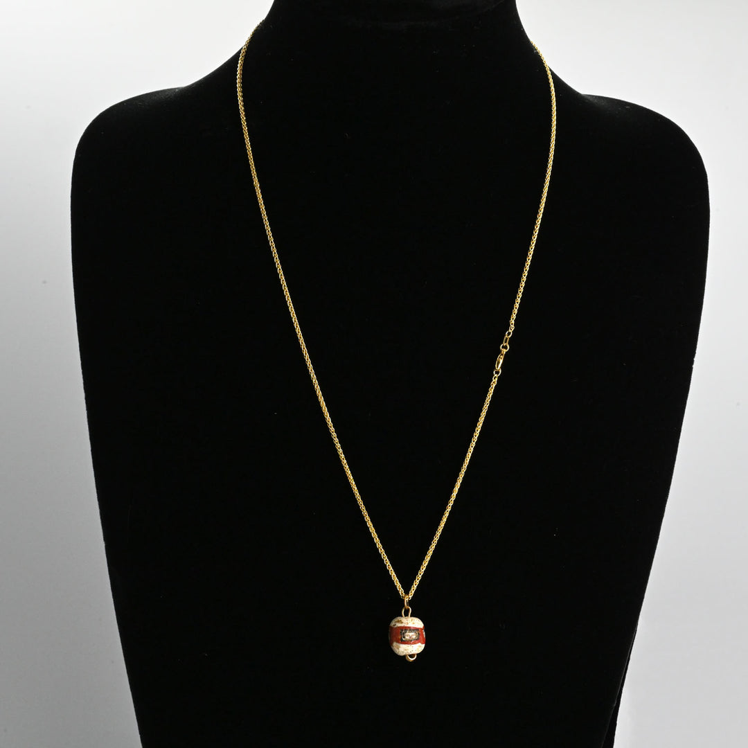 A fine Roman Glass Portrait Head Bead, Roman Imperial Period, ca. 100 - 200 CE