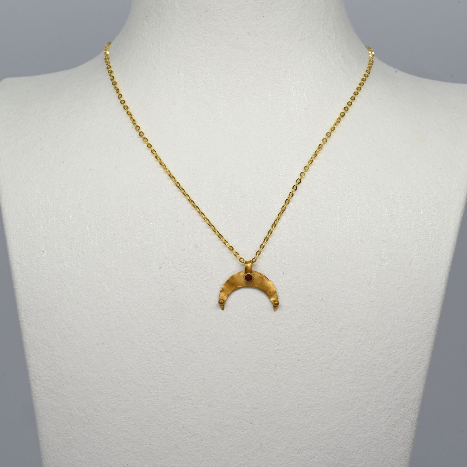 A Roman Gold and Garnet Lunar Pendant, Roman Imperial Period, ca. 2nd–3rd century CE