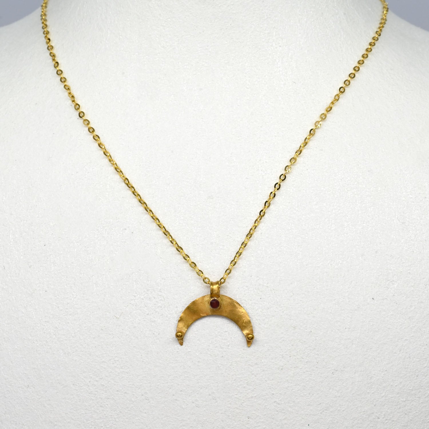 A Roman Gold and Garnet Lunar Pendant, Roman Imperial Period, ca. 2nd–3rd century CE