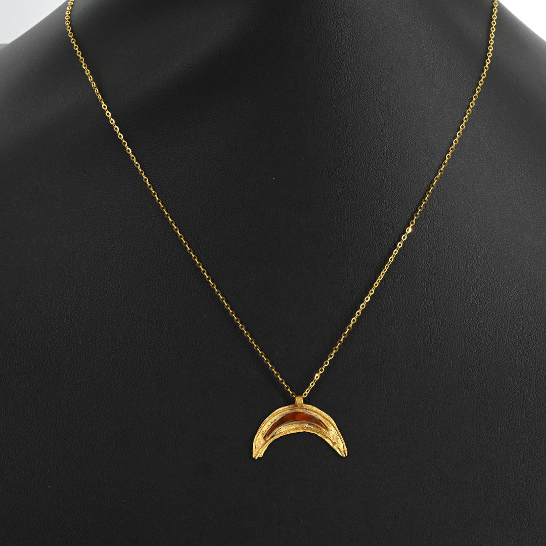 A Roman Gold and Red Jasper Luna Pendant, Roman Imperial Period, ca. 2nd- 3rd century CE