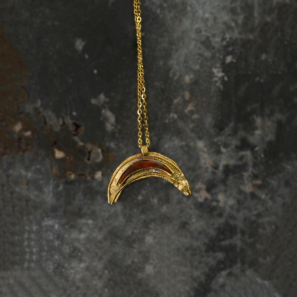 A Roman Gold and Red Jasper Luna Pendant, Roman Imperial Period, ca. 2nd- 3rd century CE