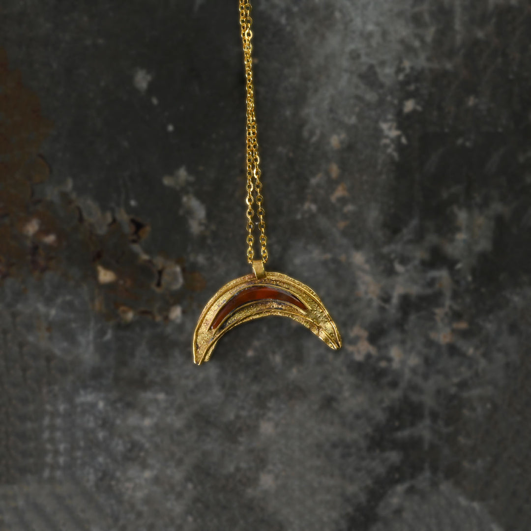 A Roman Gold and Red Jasper Luna Pendant, Roman Imperial Period, ca. 2nd- 3rd century CE