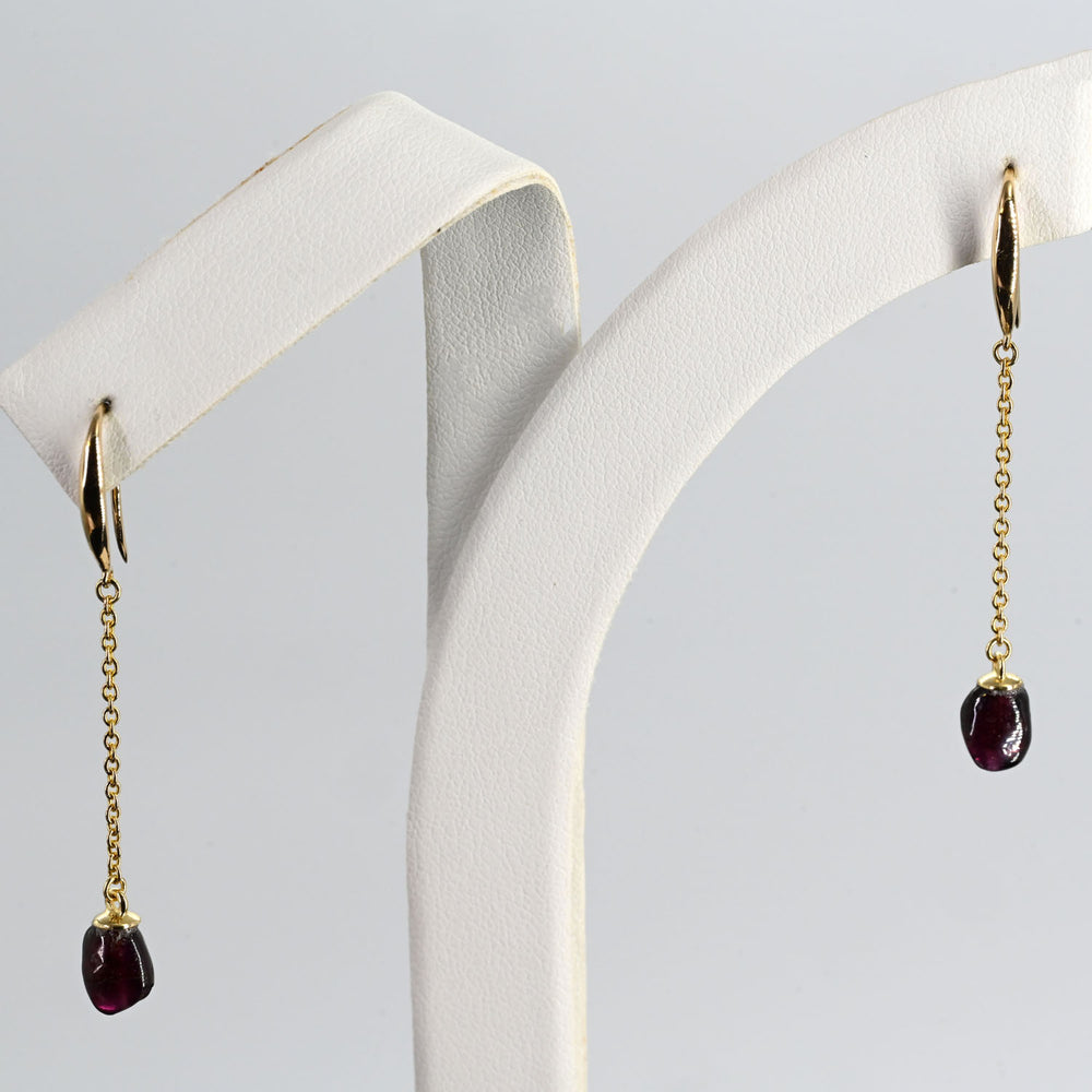 A pair of Roman Garnet Beads set as Earrings, Roman Imperial Period, ca. 1st - 2nd century CE