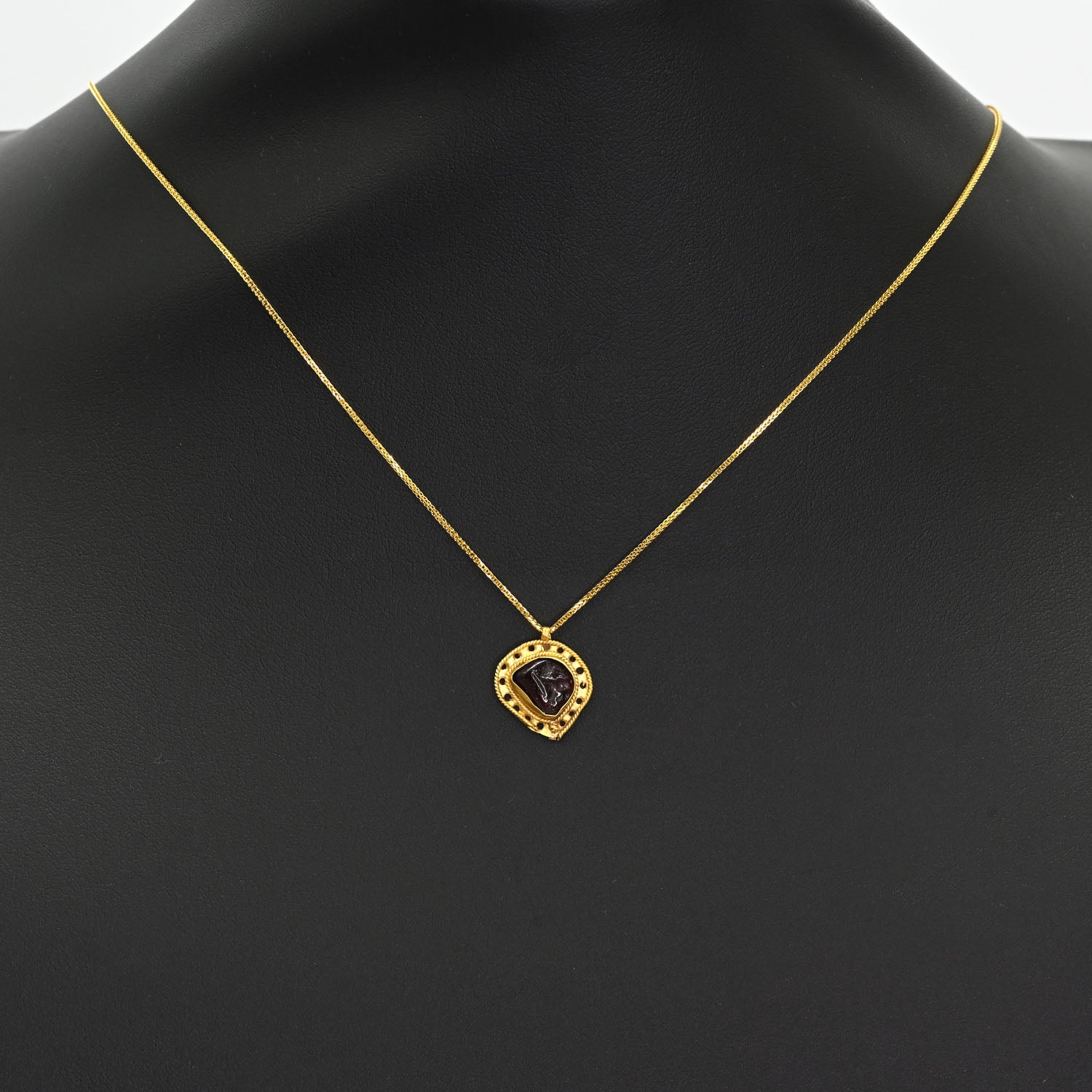 A Late Roman - Early Byzantine Gold and Garnet Pendant, ca. 4th - 6th century CE