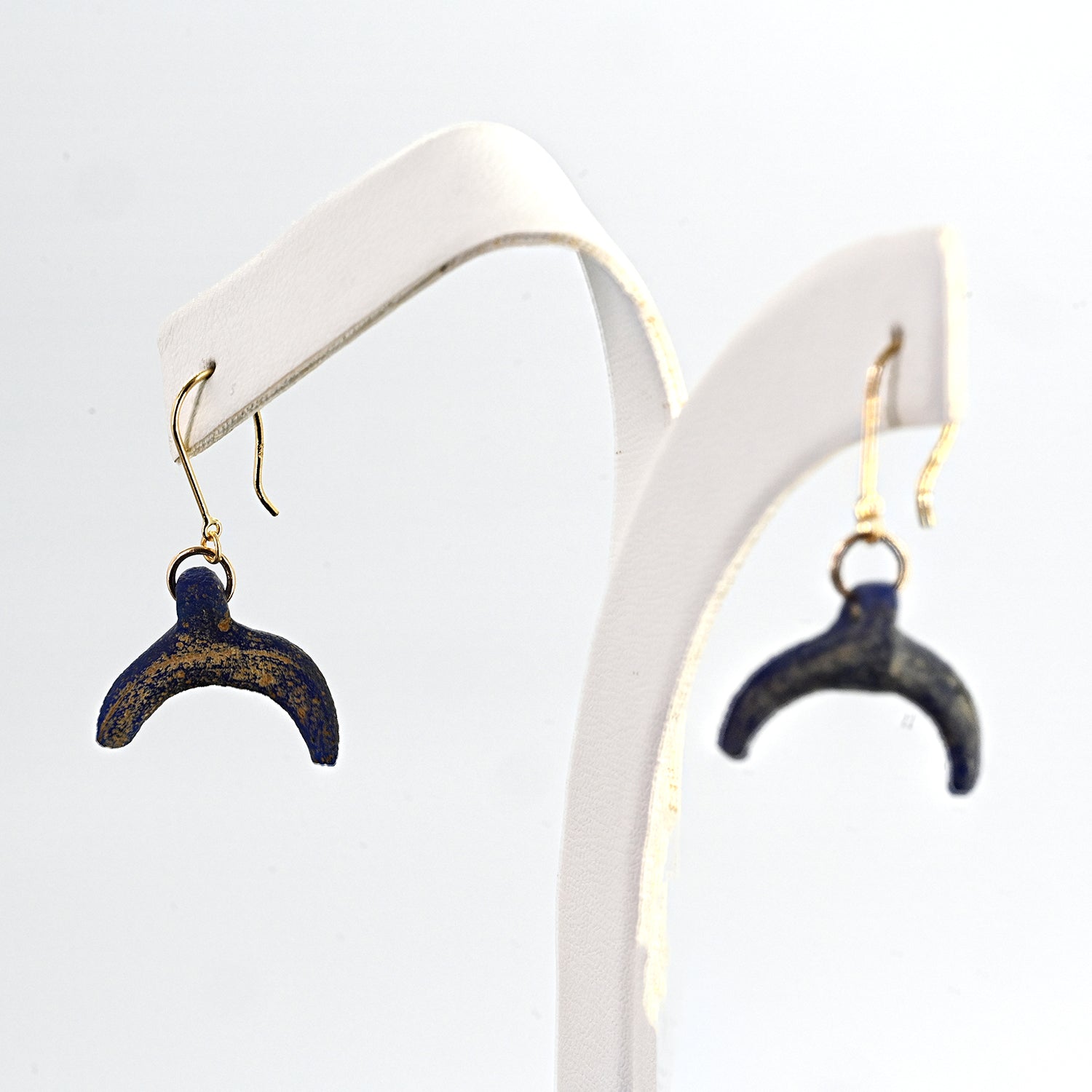 A pair of Roman Blue Glass Lunulae Earrings, Roman Imperial Period, ca. 1st - 2nd century CE