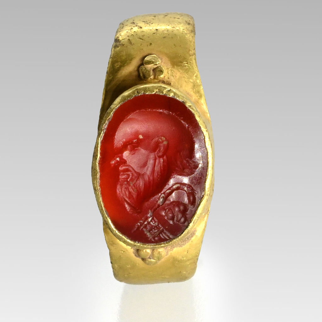 A Roman Gold Ring with Carnelian Intaglio of Socrates, Roman Imperial Period, ca. 1st - 2nd century  CE