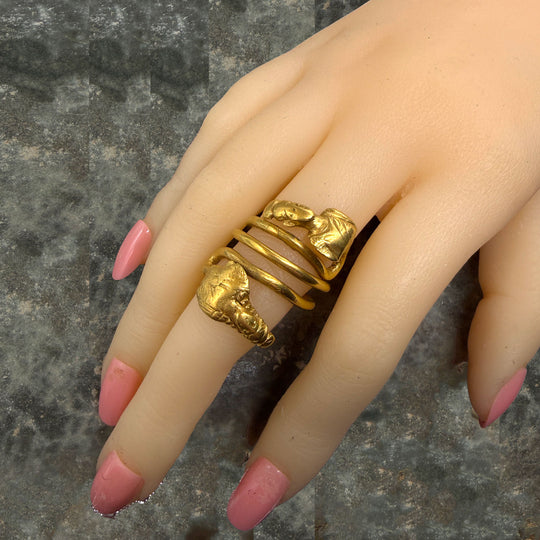 A Published Egypto-Roman Gold Spiral Snake Ring with Isis and Ptah Terminals, Roman Imperial Period, ca. 1st century CE