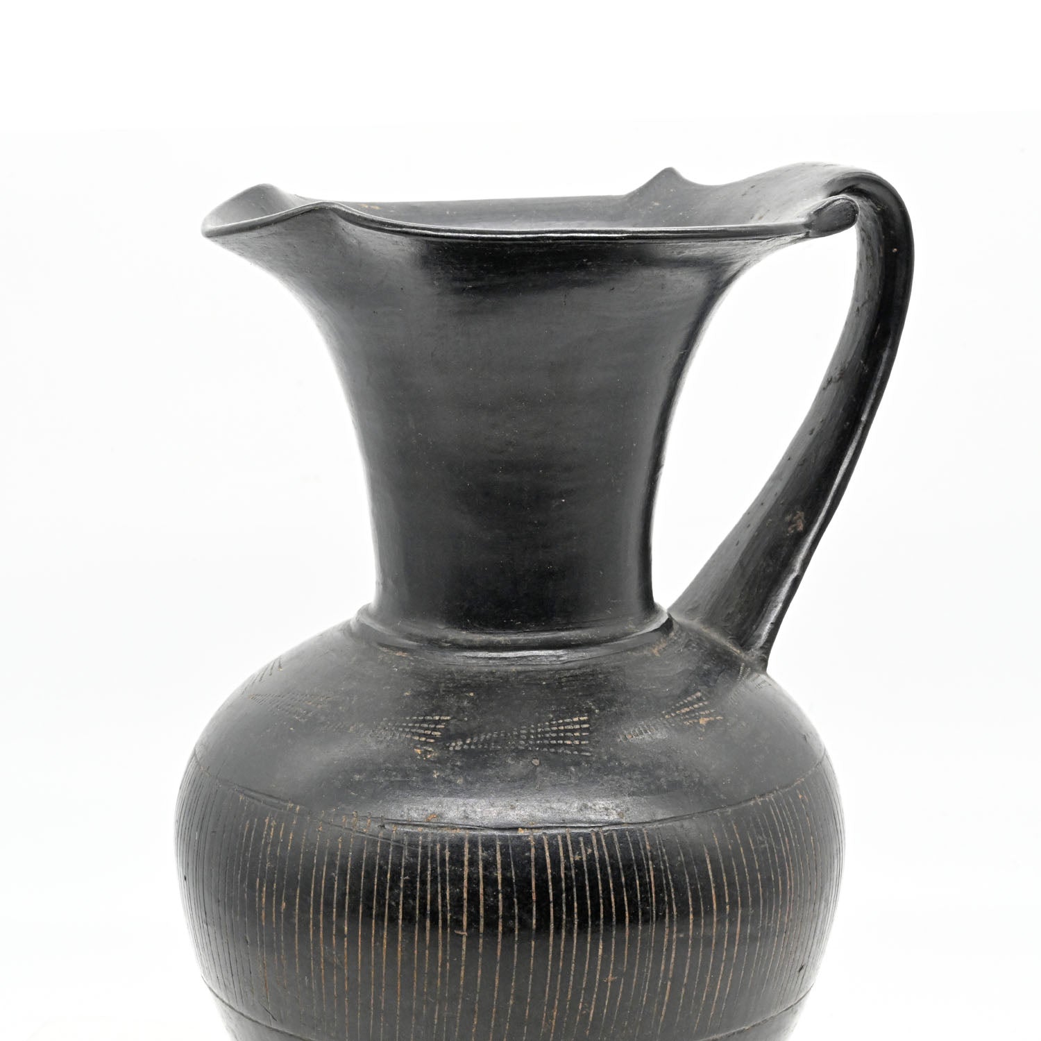 A published Etruscan Bucchero Pitcher, ca. 6th century BCE