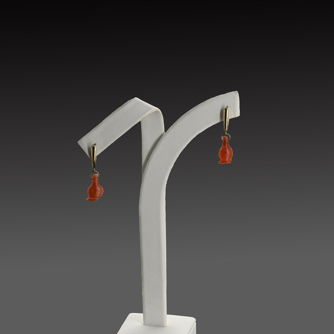 A pair of Egyptian Carnelian Poppy Beads set as Earrings, 18th Dynasty, Amarna Period, ca.  1364 - 1347 BCE