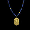 A Vintage King Tut Gold-tone Pendant set as a necklace, MMA, 1976