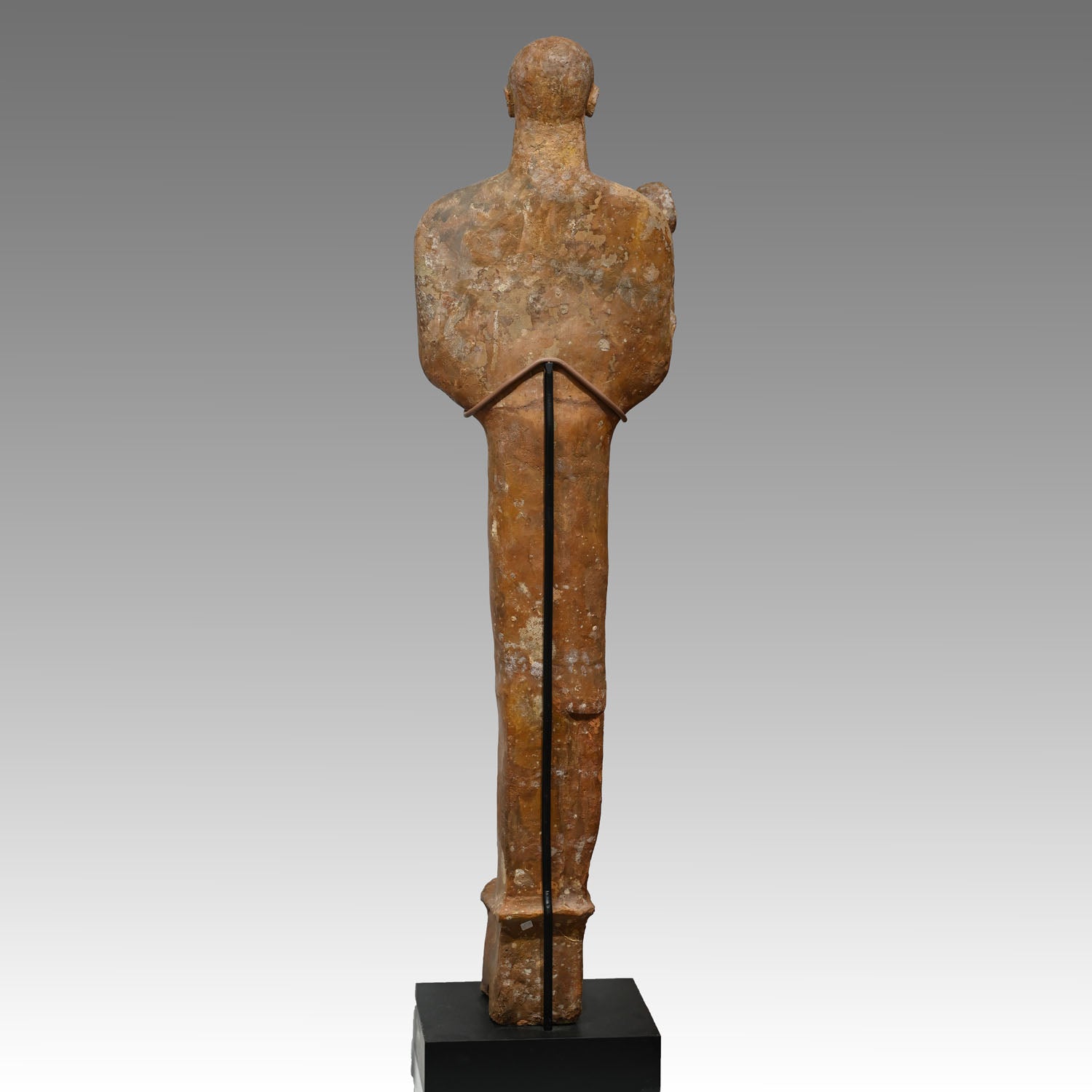 A large Phoenician terracotta standing youth, Neo Assyrian Period, ca. 6th century BCE