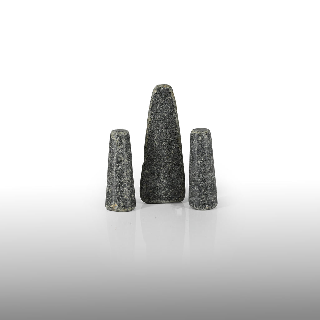 A set of three rare Sumerian Granite Gaming Pieces, Early Bronze Age, ca. 3100 - 2200 BCE