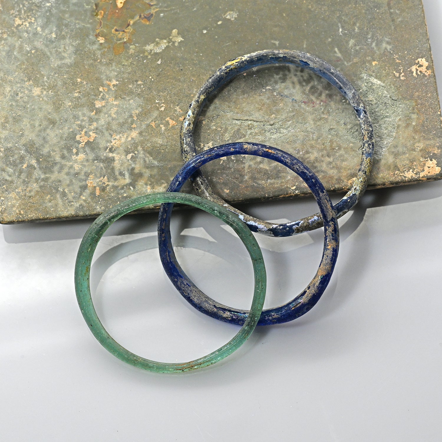 A Group of Three Roman Glass Bangles, Roman Imperial Period, ca. 1st - 3rd century CE