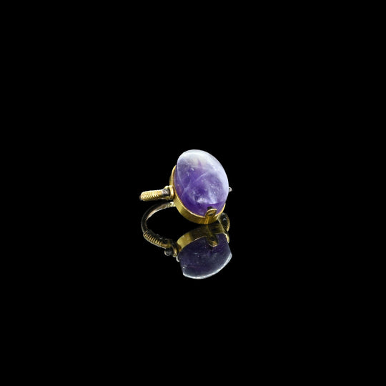 An Egyptian Amethyst Scaraboid, Middle Kingdom, ca. 2040 - 1783 BCE