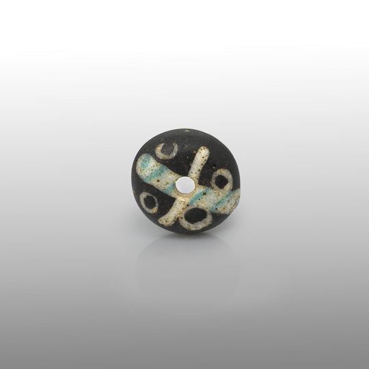 A Roman Decorated Glass Spindle Whorl,  Roman Imperial Period, ca. 2nd - 3rd century CE