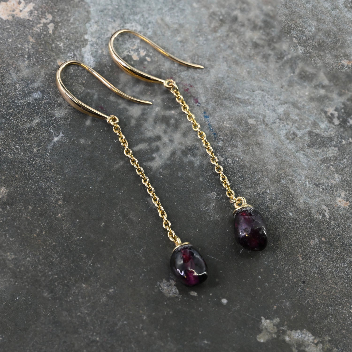 A pair of Roman Garnet Beads set as Earrings, Roman Imperial Period, ca. 1st - 2nd century CE