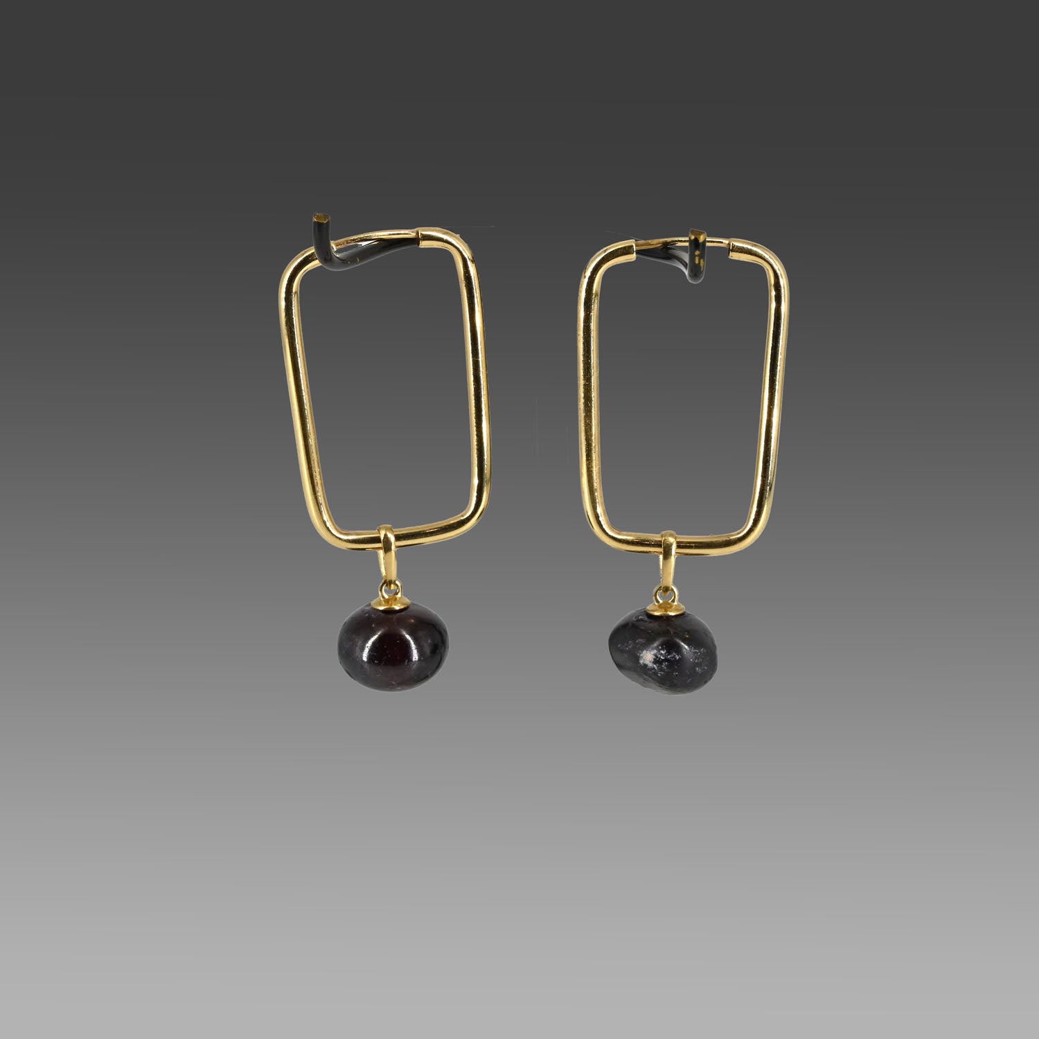 A Pair of Persian Garnet Beads set as earrings, Achaemenid Empire, ca. 550 - 330 BCE