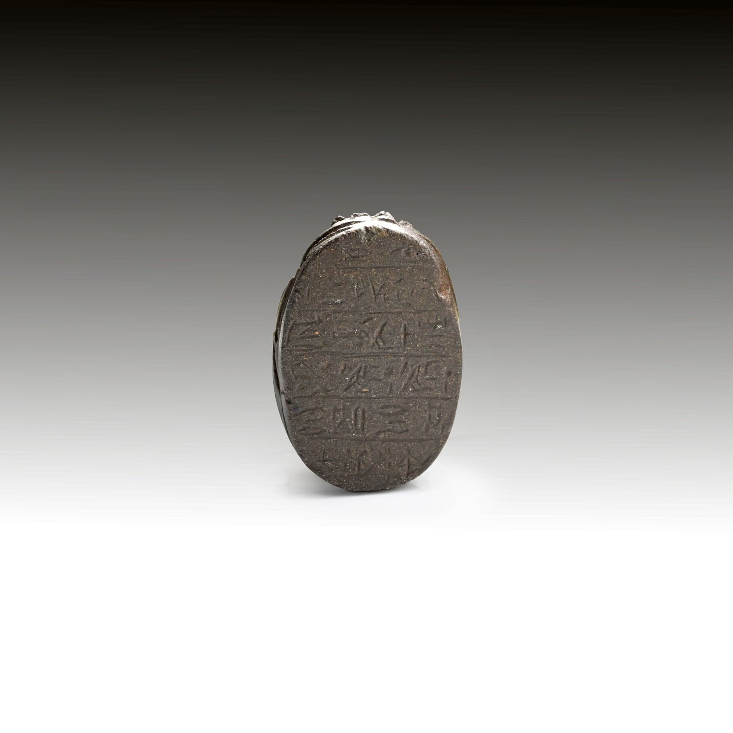 A Published Egyptian Basalt Heart Scarab, New Kingdom, 20th Dynasty, ca. 1196 - 1070 BCE