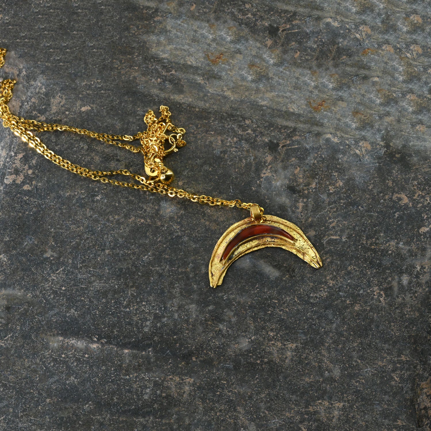 A Roman Gold and Red Jasper Luna Pendant, Roman Imperial Period, ca. 2nd- 3rd century CE