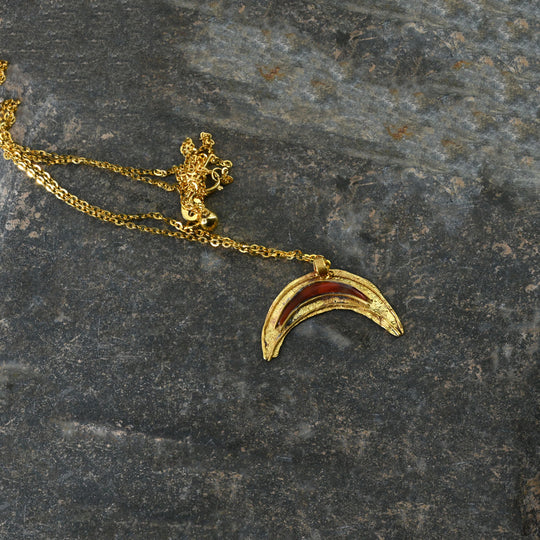 A Roman Gold and Red Jasper Luna Pendant, Roman Imperial Period, ca. 2nd- 3rd century CE