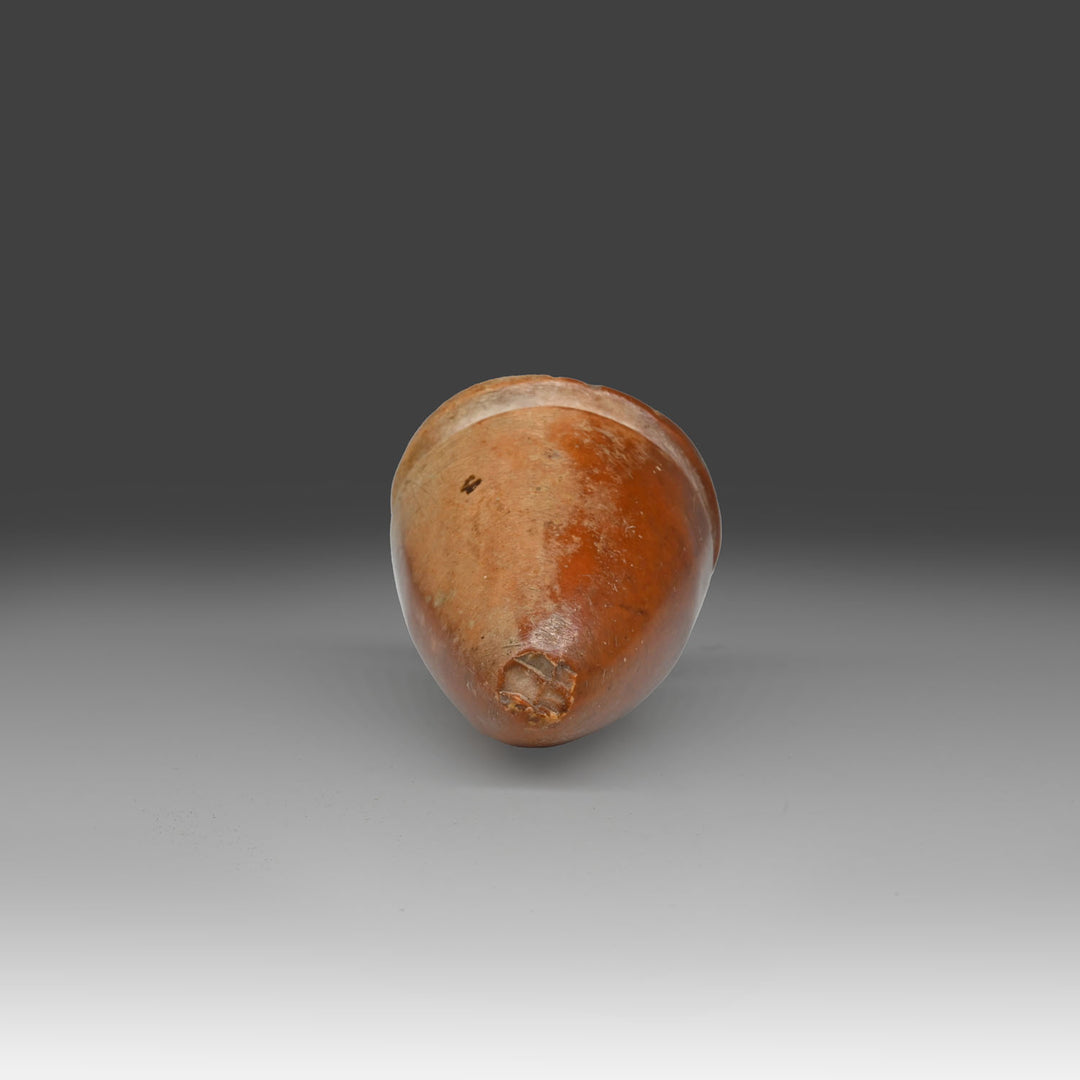 A miniature Egyptian Breccia Model Vessel, Old Kingdom, ca. 2575 - 2134 BCE