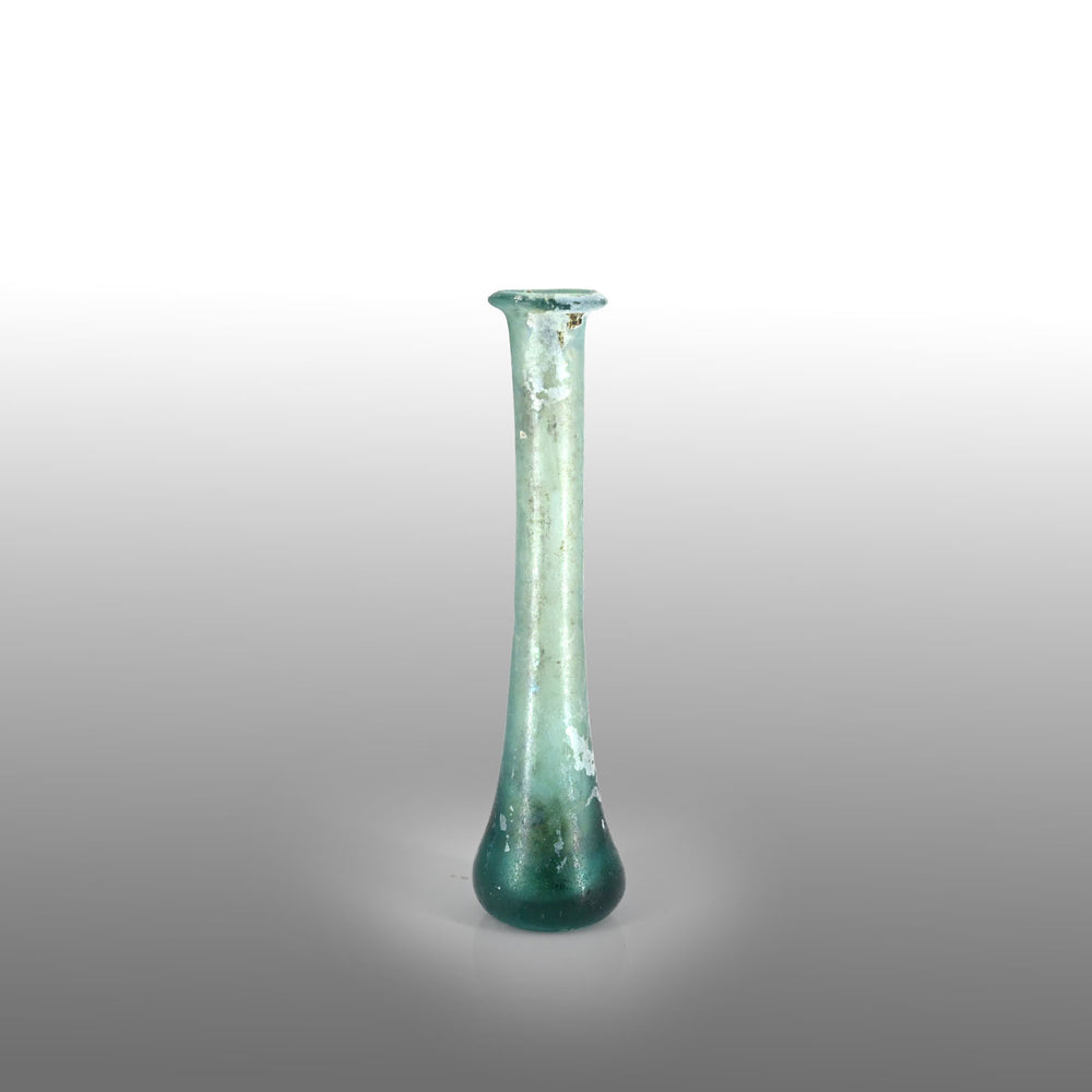 A Roman Aqua Blue Glass Tear Bottle, Roman Imperial Period, ca. 1st - 2nd century CE