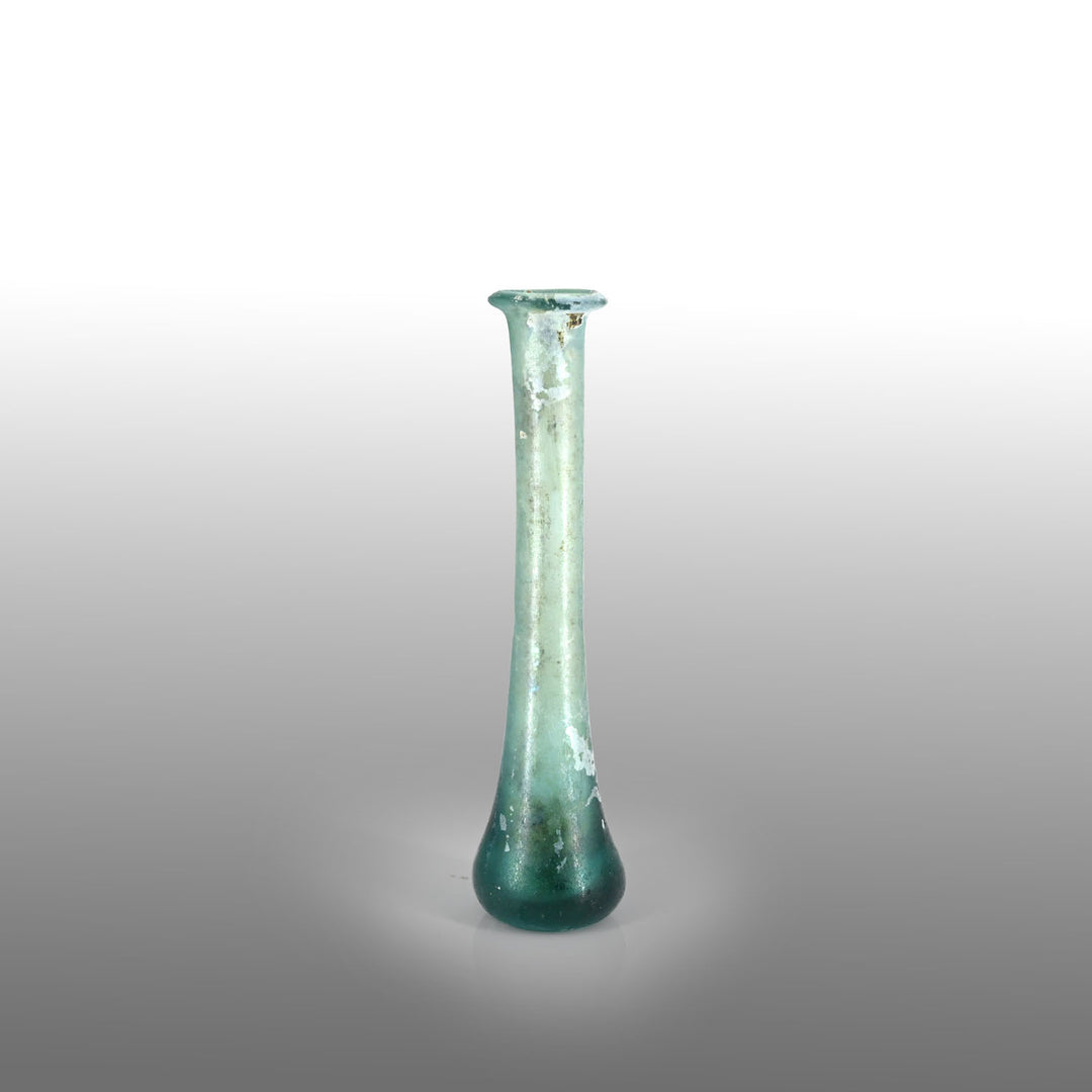 A Roman Aqua Blue Glass Tear Bottle, Roman Imperial Period, ca. 1st - 2nd century CE