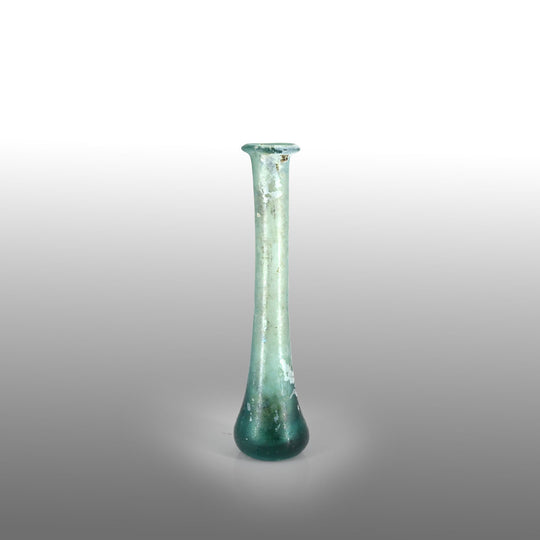 A Roman Aqua Blue Glass Tear Bottle, Roman Imperial Period, ca. 1st - 2nd century CE