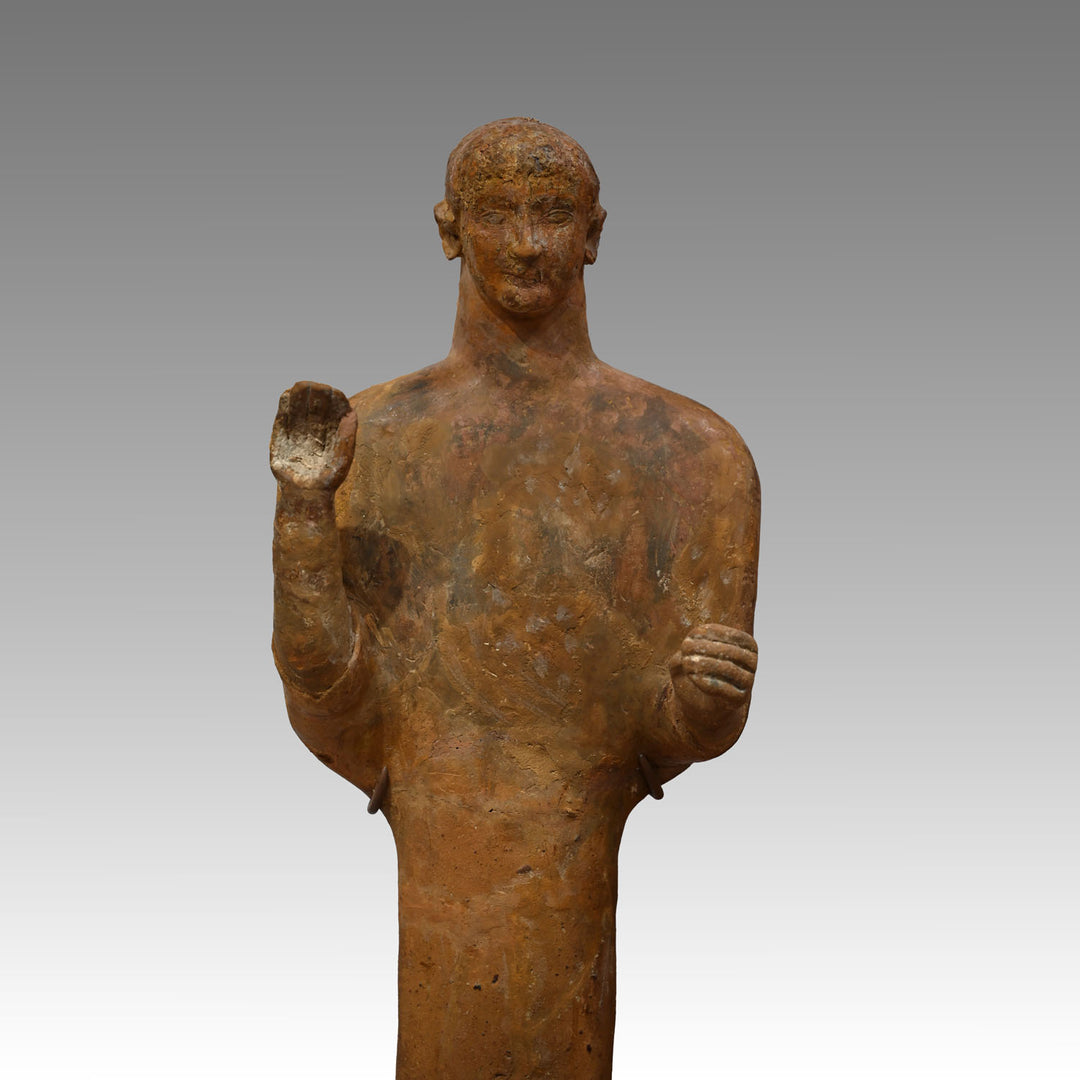 A large Phoenician terracotta standing youth, Neo Assyrian Period, ca. 6th century BCE