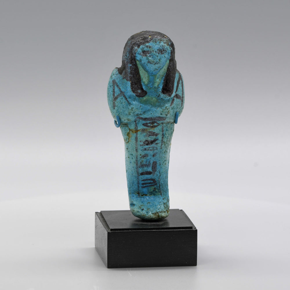 An Egyptian bright blue glazed shabti for Meret-Amun, 21st Dynasty, Thebes, Deir el Bahri Cache II, ca. 990 - 970 BCE