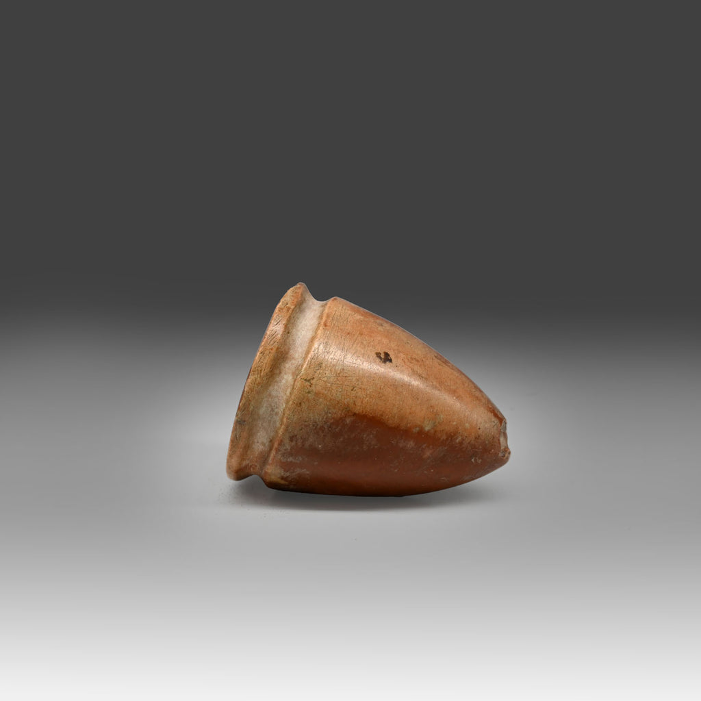 A miniature Egyptian Breccia Model Vessel, Old Kingdom, ca. 2575 - 2134 BCE