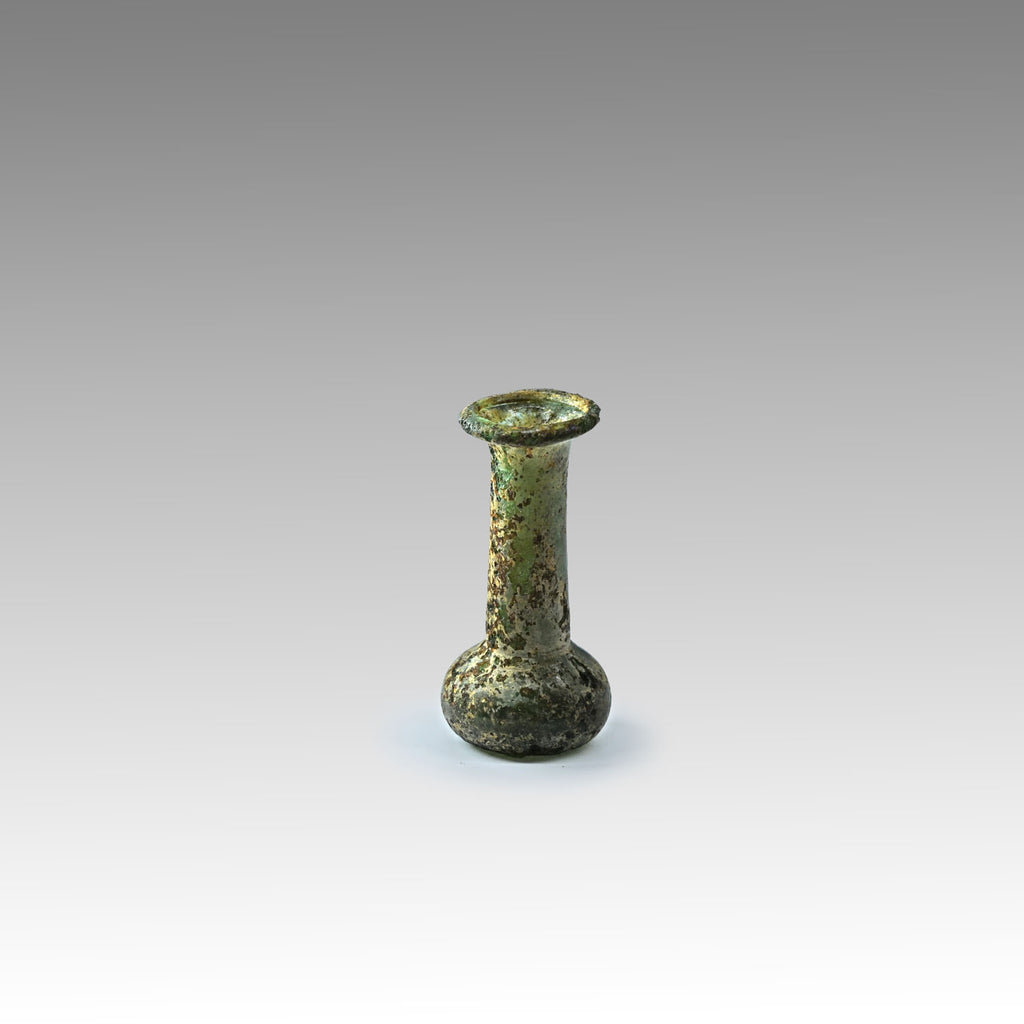 A miniature Roman Green Glass vial, ca. 1st - 3rd century CE