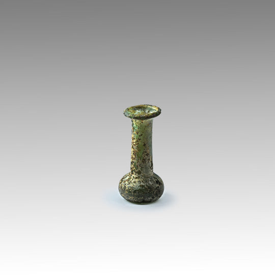 A miniature Roman Green Glass vial, ca. 1st - 3rd century CE