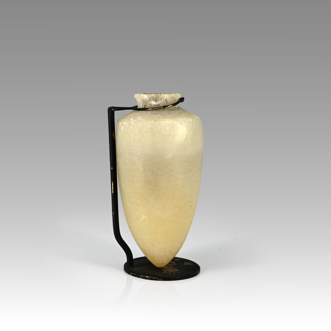 An Egyptian pointed-base alabastron, New Kingdom, ca. 1570 - 1070