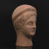 An Etruscan Terracotta Votive Head of A Goddess, <br><em>ca. 4th - 3rd century BCE</em>