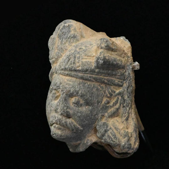 Ein Gandhara-Schiefer-Kopf eines Anhängers, ca. 1. Jahrhundert v. Chr./n. Chr