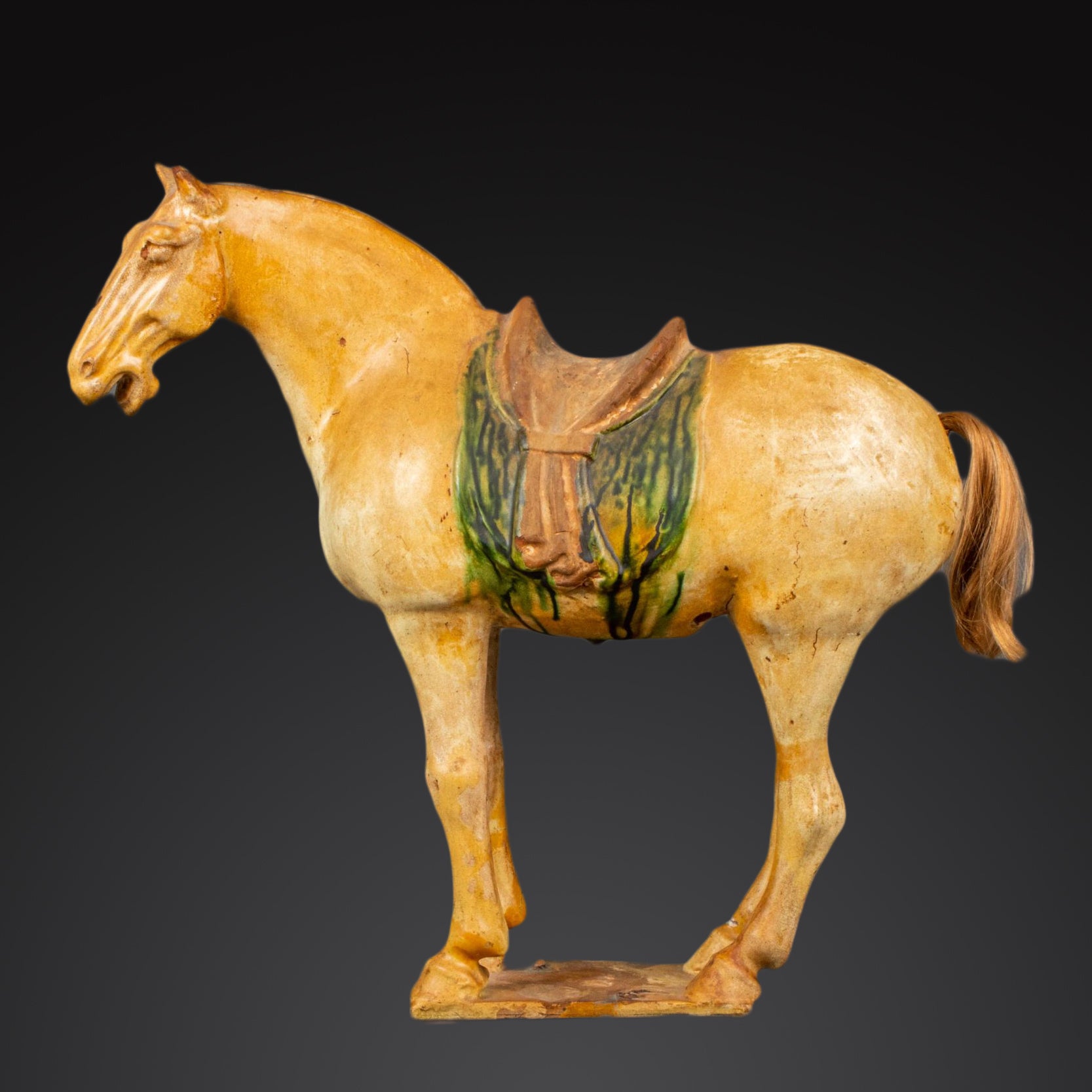 A Chinese Sancai Glazed Pottery Horse, Tang Dynasty, <br><em>ca. 618 - 906 CE</em>