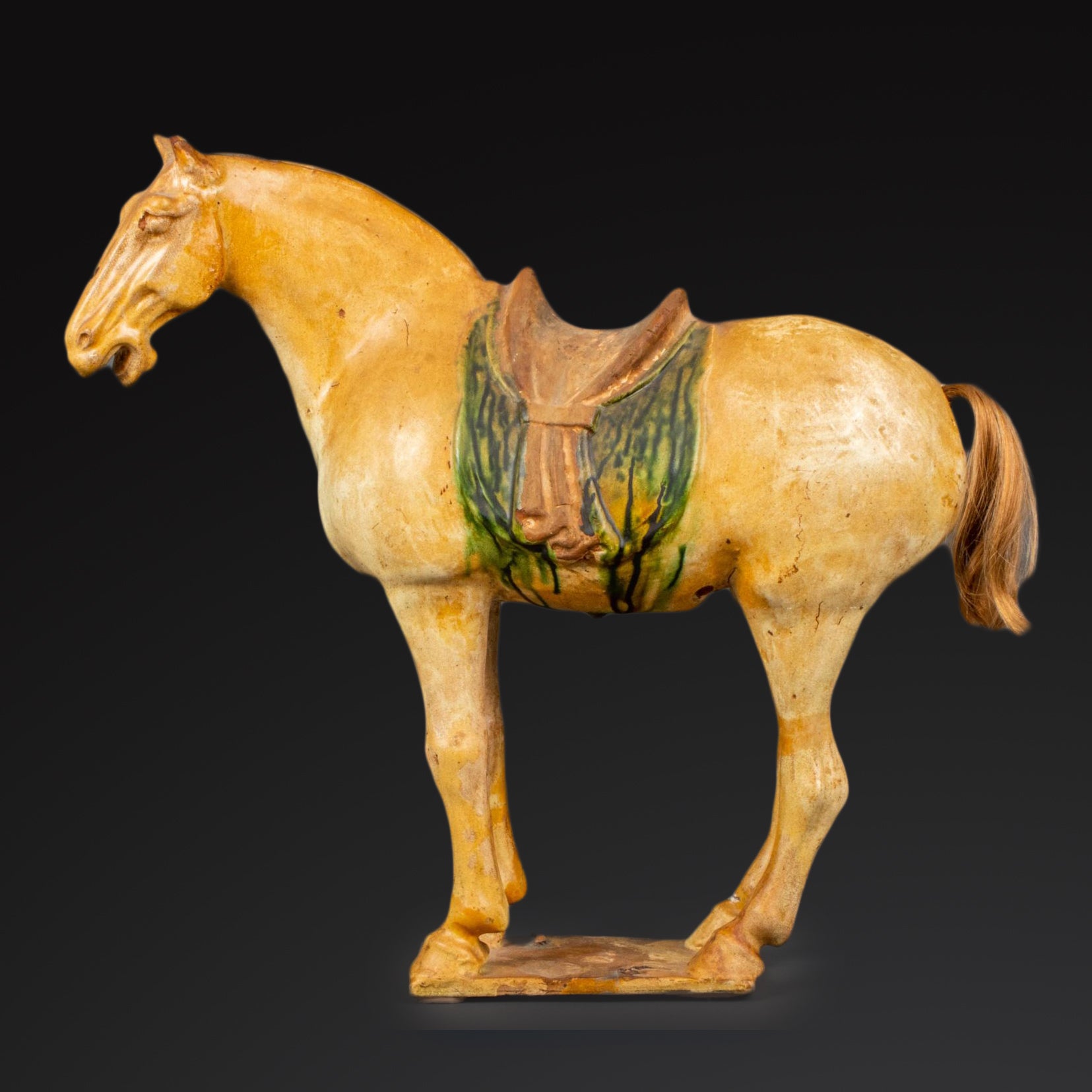 A Chinese Sancai Glazed Pottery Horse, Tang Dynasty, <br><em>ca. 618 - 906 CE</em>